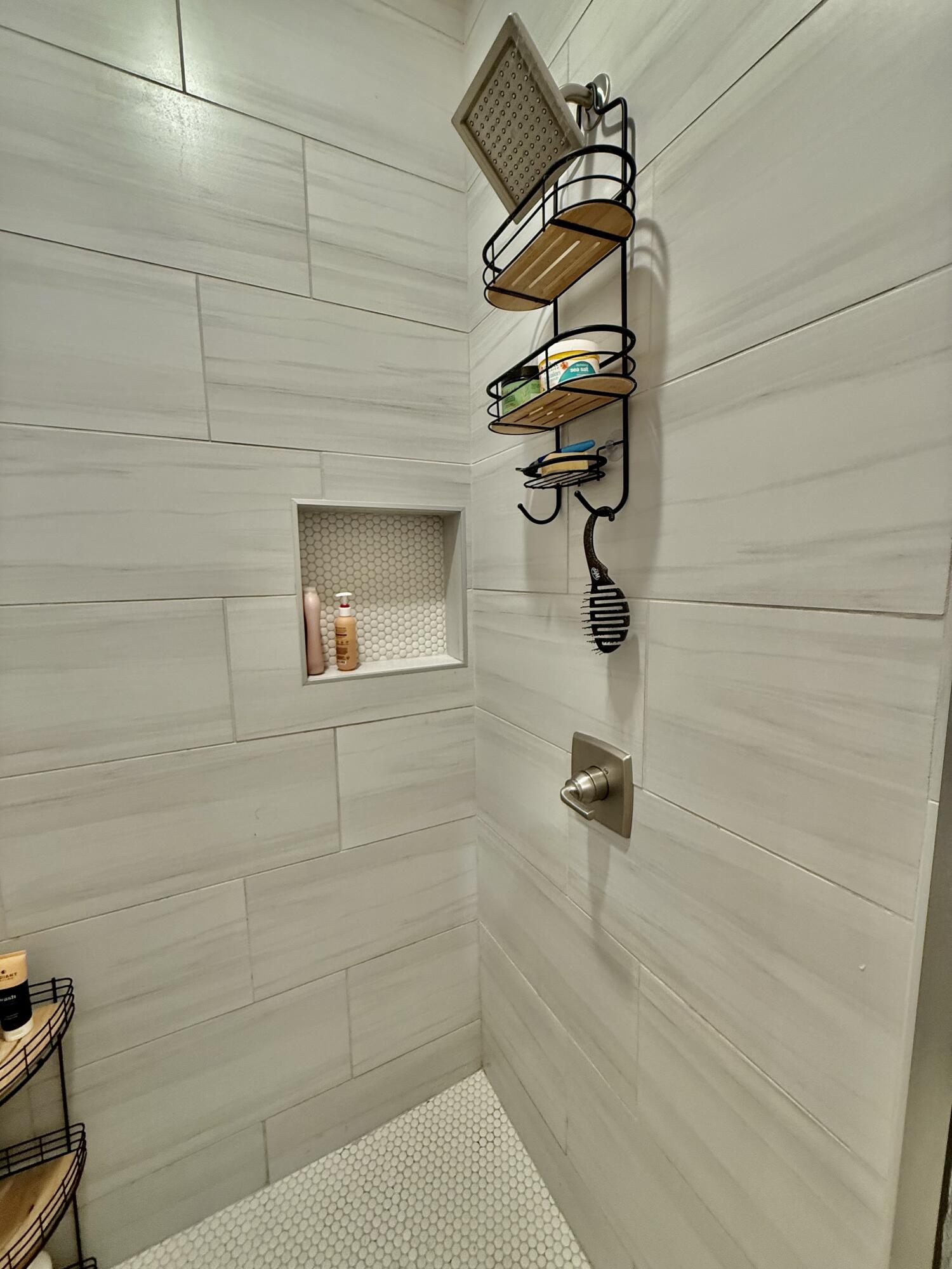 5833 Virginia Avenue Lubbock, TX 79407 - Photo 16 of 33 a bathroom with a shower