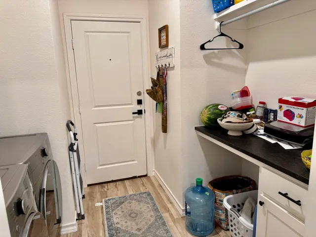 a bathroom with a sink toilet and a mirror