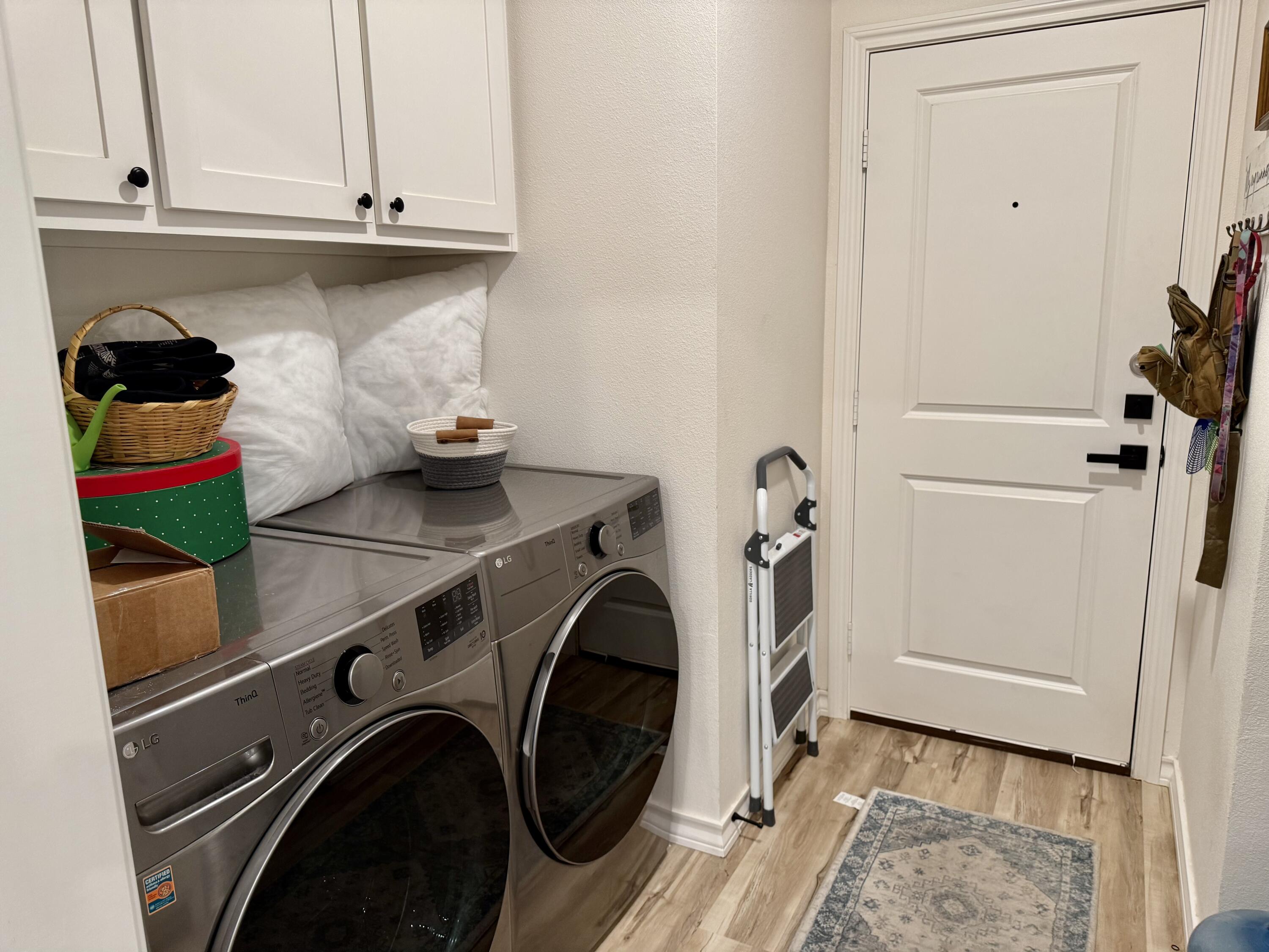 5833 Virginia Avenue Lubbock, TX 79407 - Photo 28 of 33 a utility room with dryer and washer