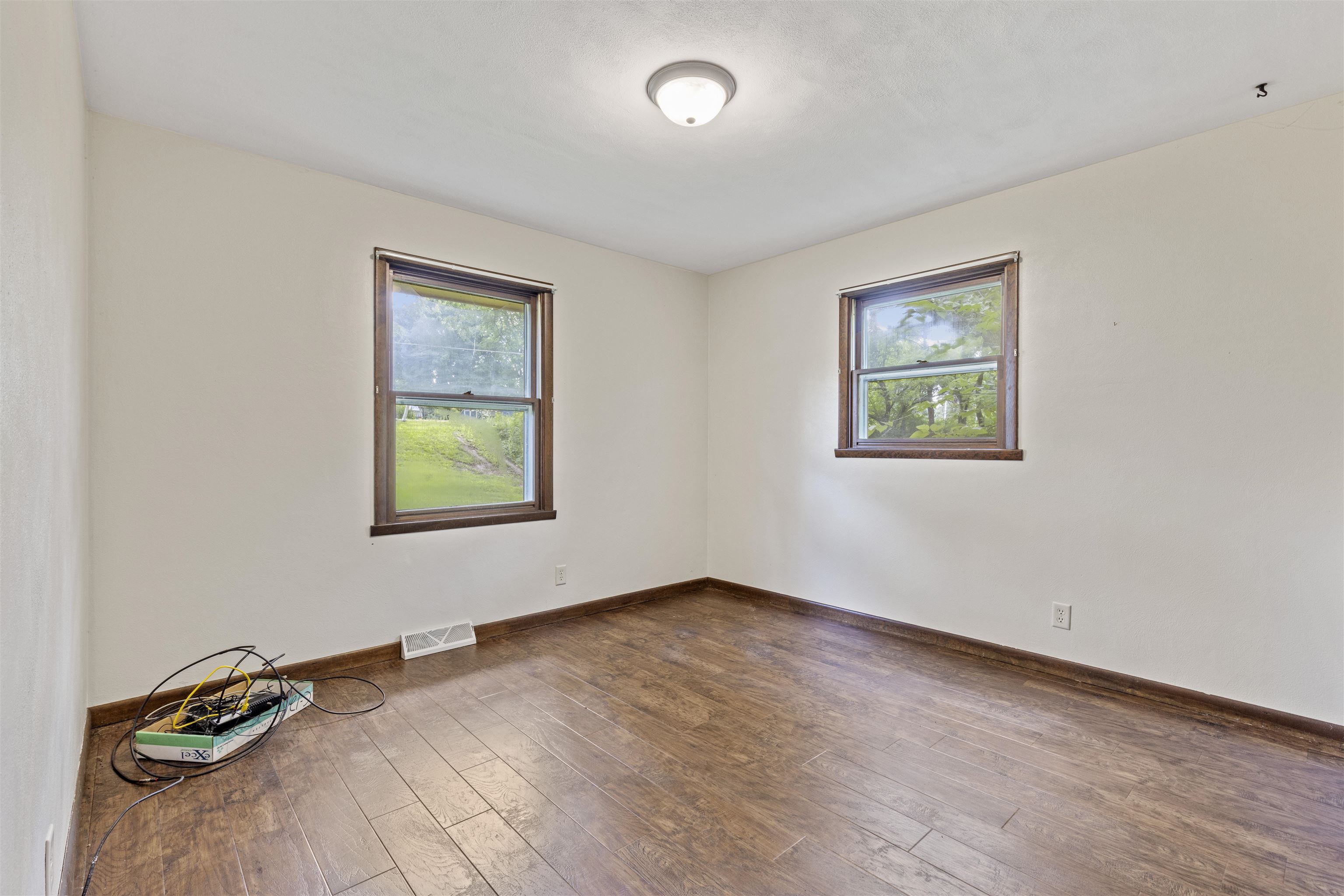 10234 Atwood Road Roscoe, IL 61073 - Photo 7 of 31 an empty room with a window
