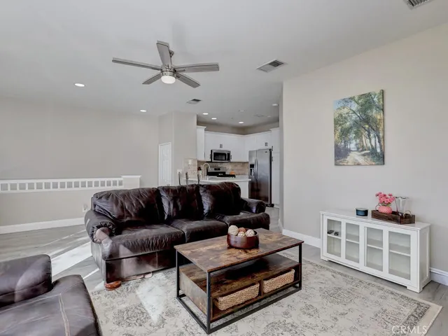 a kitchen with a stove sink and microwave