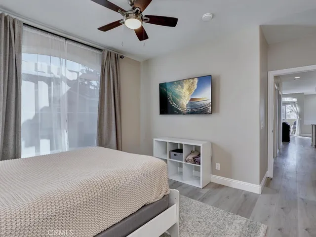 a bedroom with a bed and a closet