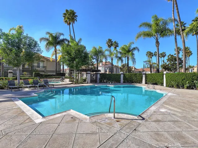 a view of a swimming pool with a patio