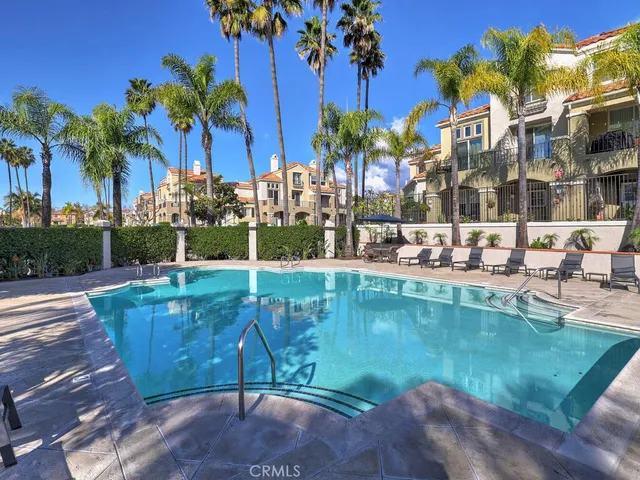 a view of a swimming pool with a patio