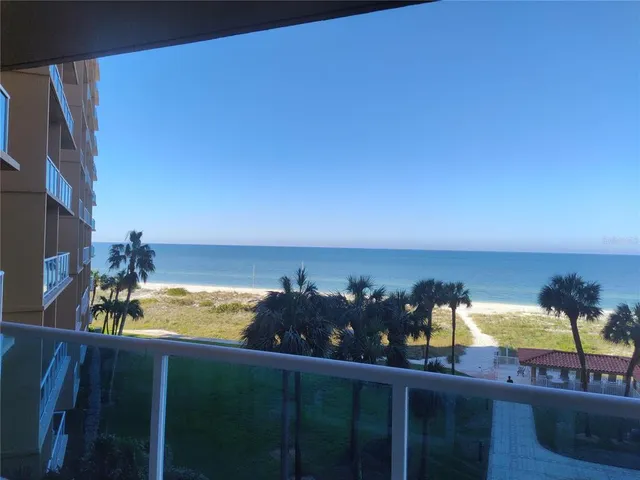 a view of a ocean from a balcony