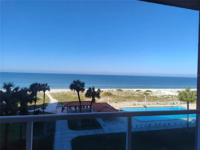 a view of a ocean from a balcony