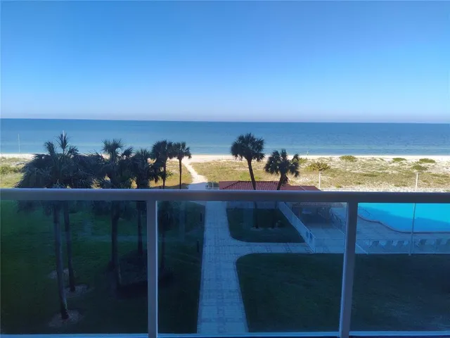 a view of a ocean from a balcony