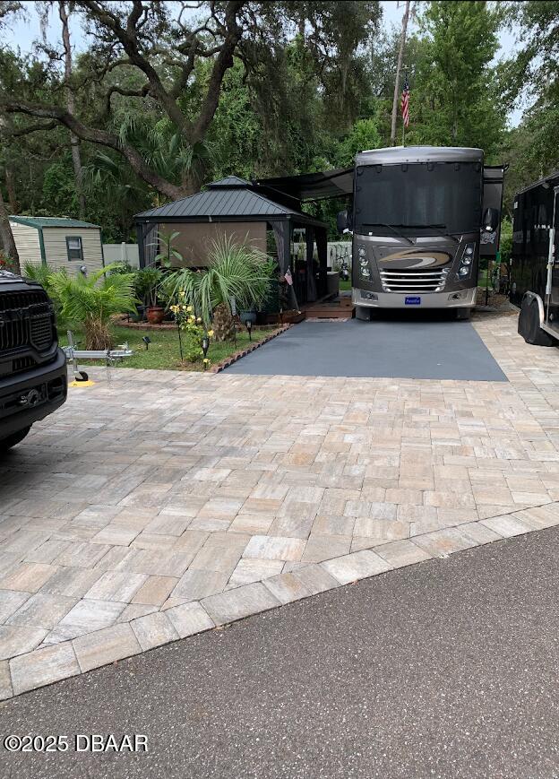 a view of a car park in front of house