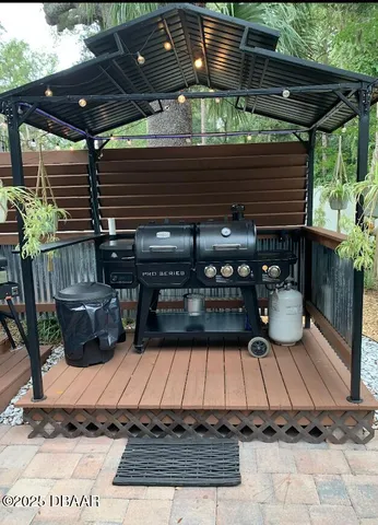 a swimming pool view with a seating space