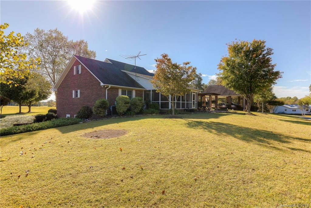 34863 Finger Road Mount Pleasant, NC 28124 - Photo 27 of 32 a house with swimming pool in front of it