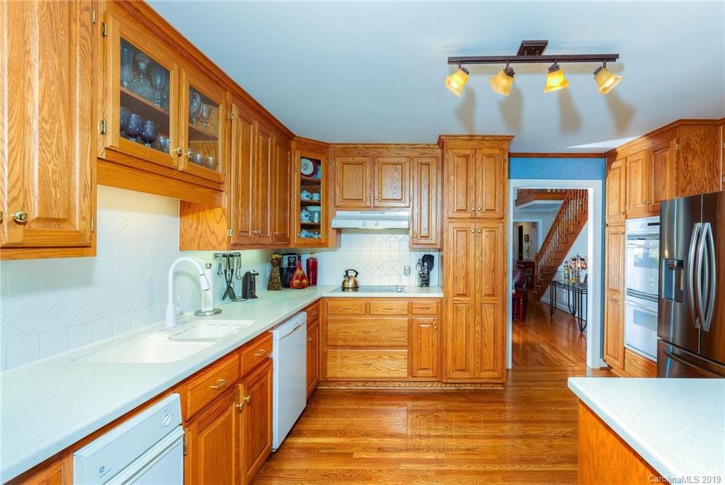 34863 Finger Road Mount Pleasant, NC 28124 - Photo 6 of 32 a kitchen with stainless steel appliances granite countertop a sink and cabinets