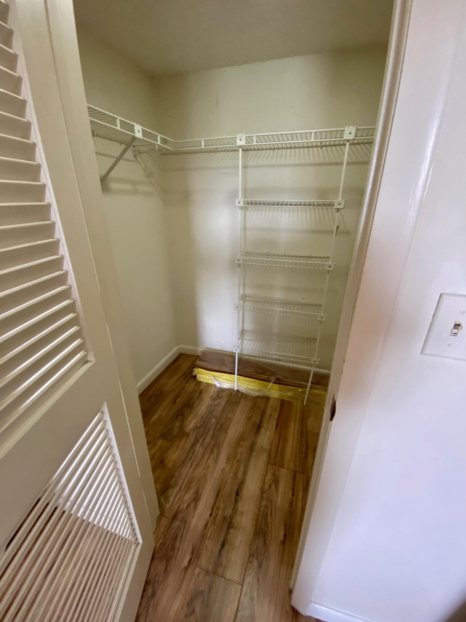1271 Southeast Parkview Place, Unit H4 Stuart, FL 34994 - Photo 14 of 15 a view of walk in closet