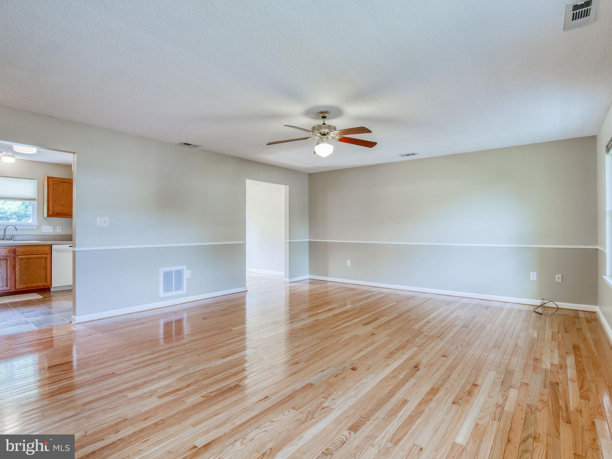 202 Woodrow Road Winchester, VA 22602 - Photo 6 of 33 Stunning hardwood floors in large living room