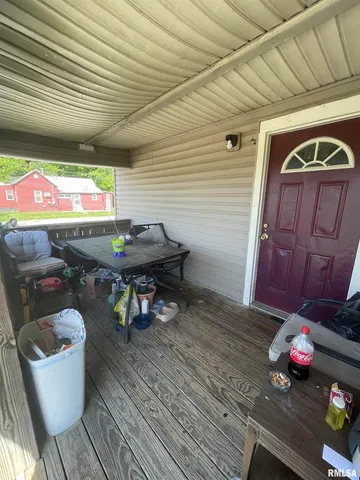 a room with furniture and wooden floor