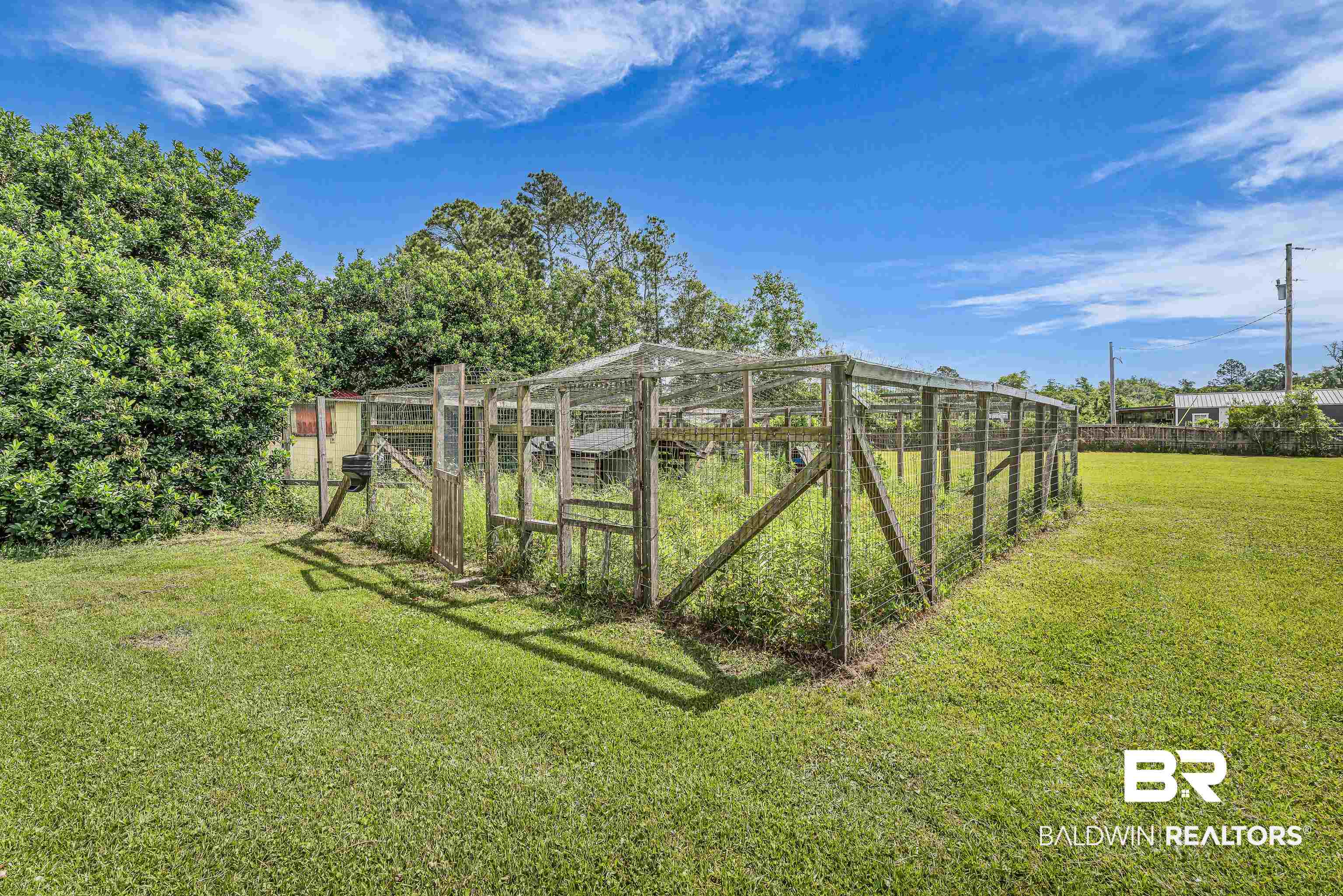 9530 Pilgrim Drive Elberta, AL 36530 - Photo 40 of 61 View of yard featuring exterior structure and fence