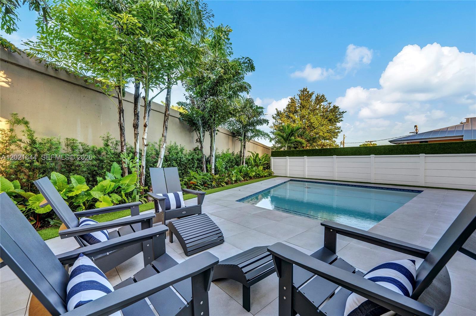 7800 Southwest 9th Terrace Miami, FL 33144 - Photo 15 of 64 a view of a backyard with sitting area