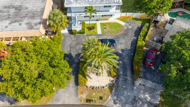 a view of a swimming pool with a patio