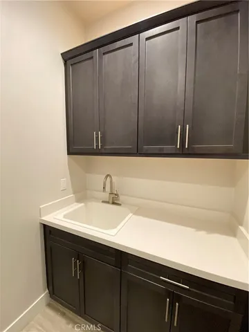 a workspace with furniture and wooden floor