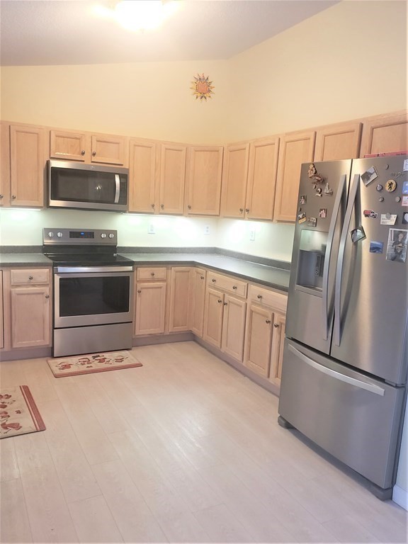 174 Old Belchertown Road Ware, MA 01082 - Photo 12 of 42 a kitchen with cabinets and stainless steel appliances