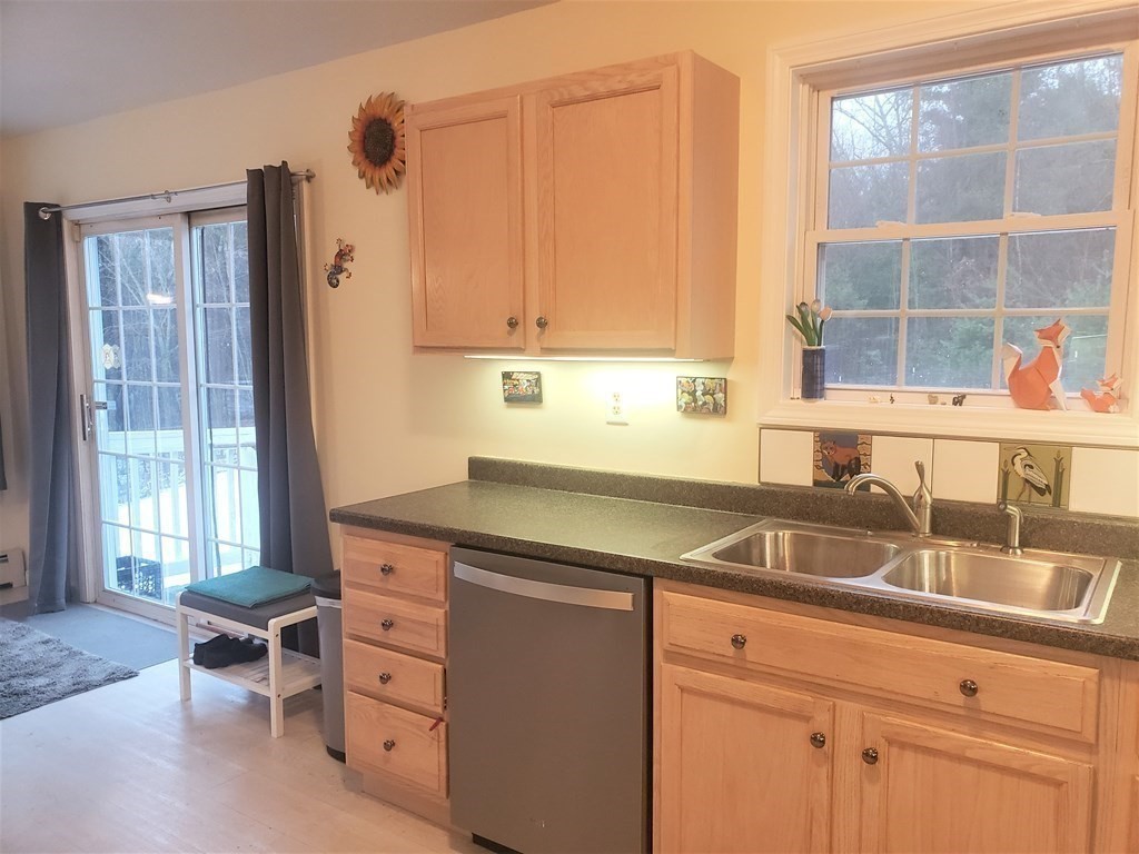 174 Old Belchertown Road Ware, MA 01082 - Photo 16 of 42 a kitchen with granite countertop a sink and a window