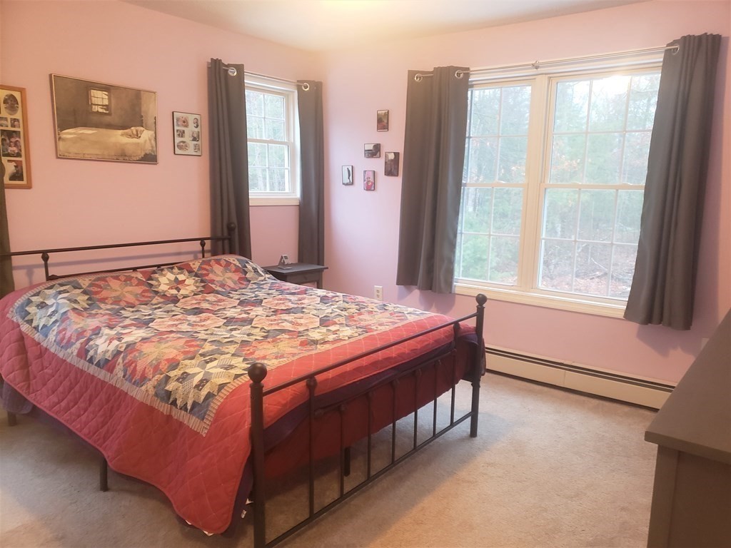 174 Old Belchertown Road Ware, MA 01082 - Photo 21 of 42 a bedroom with a bed and window