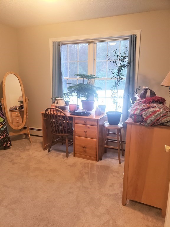 174 Old Belchertown Road Ware, MA 01082 - Photo 29 of 42 a room with furniture and a fireplace