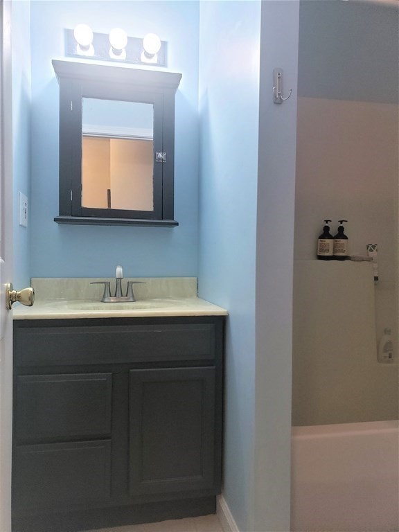 174 Old Belchertown Road Ware, MA 01082 - Photo 35 of 42 a bathroom with a sink vanity and mirror