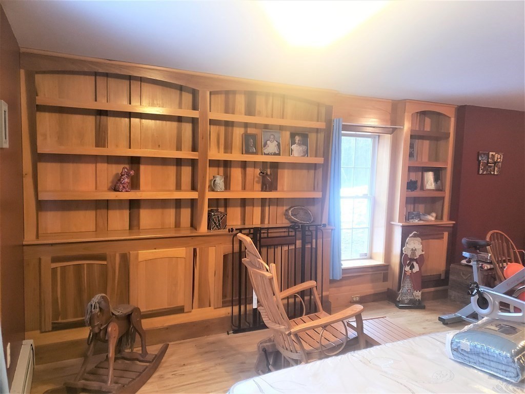 174 Old Belchertown Road Ware, MA 01082 - Photo 38 of 42 a view of a livingroom with workspace and a window