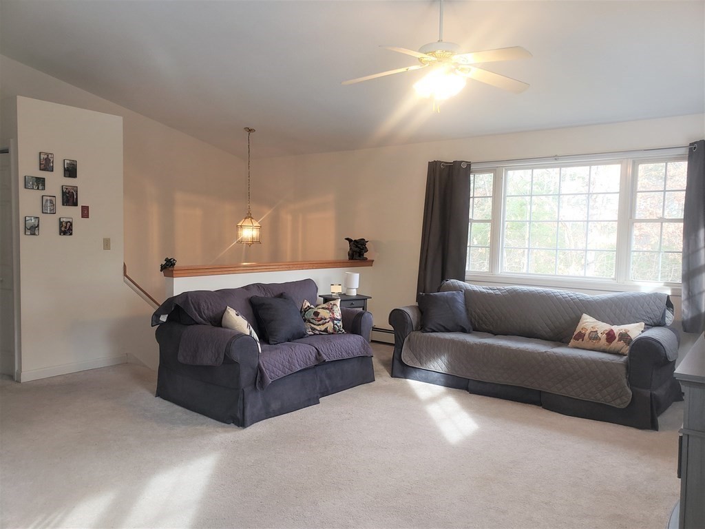 174 Old Belchertown Road Ware, MA 01082 - Photo 6 of 42 a living room with furniture and a large window