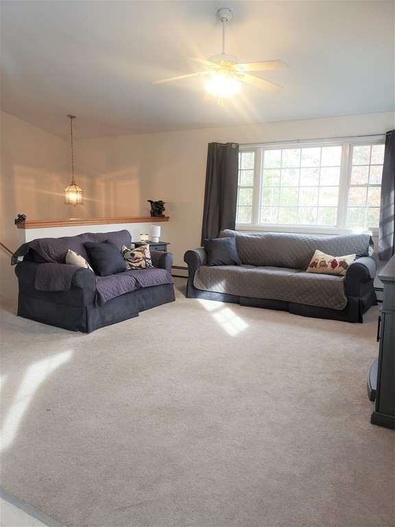 174 Old Belchertown Road Ware, MA 01082 - Photo 7 of 42 a living room with furniture and a large window