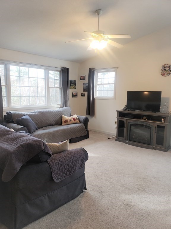 174 Old Belchertown Road Ware, MA 01082 - Photo 8 of 42 a living room with furniture and a flat screen tv