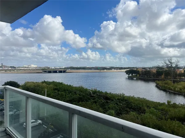a view of a lake from a balcony