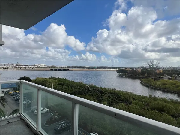 a view of a lake from a balcony