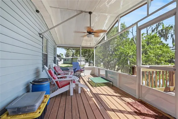 a balcony with wooden floor