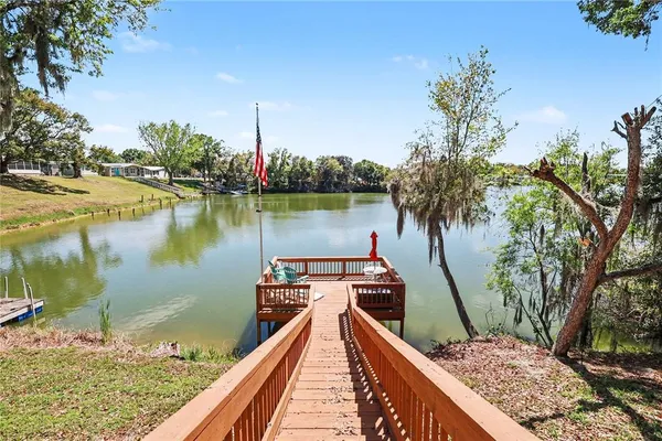 a view of a lake with a large bridge