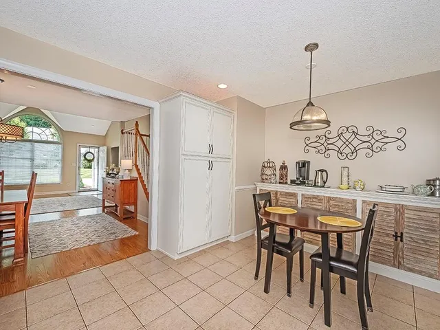 a view of a dining room with furniture