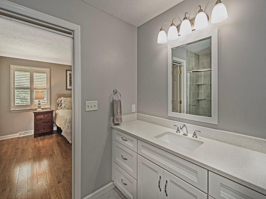 406 Country View Drive Lower Burrell, PA 15068 - Photo 20 of 31 a en suite bathroom with a sink double vanity and mirror