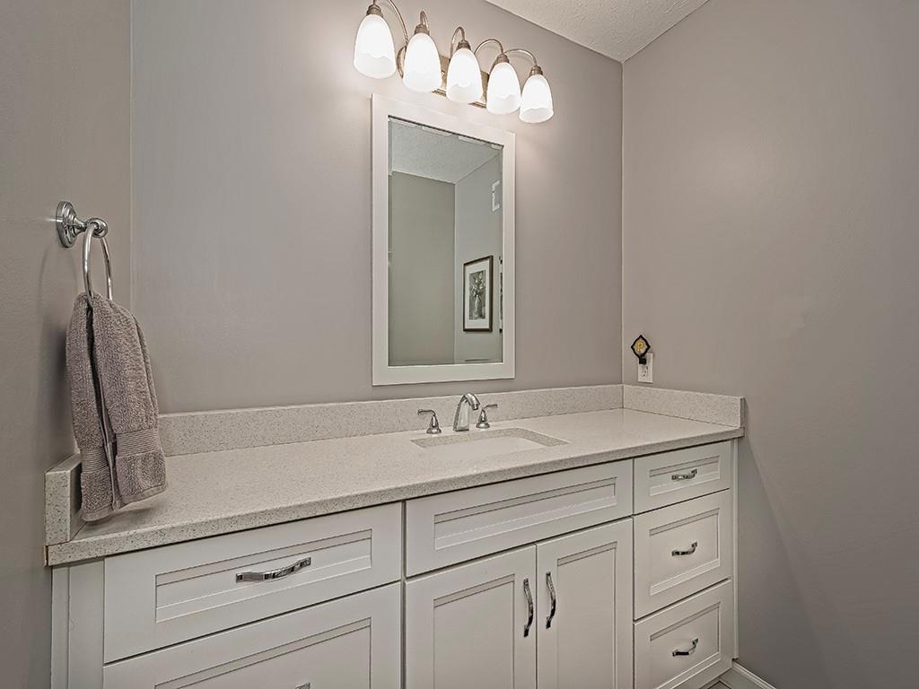 406 Country View Drive Lower Burrell, PA 15068 - Photo 21 of 31 a bathroom with a sink vanity and mirror