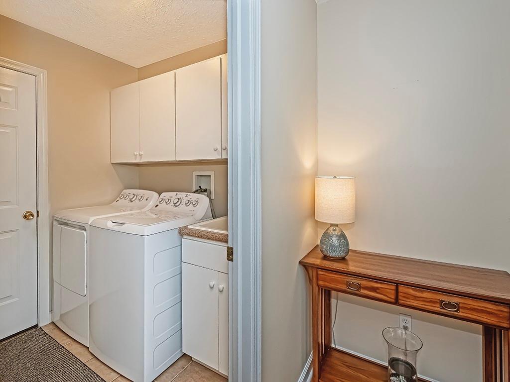 406 Country View Drive Lower Burrell, PA 15068 - Photo 23 of 31 a room with a sink and a mirror