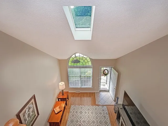 a front view of a house with wooden floor