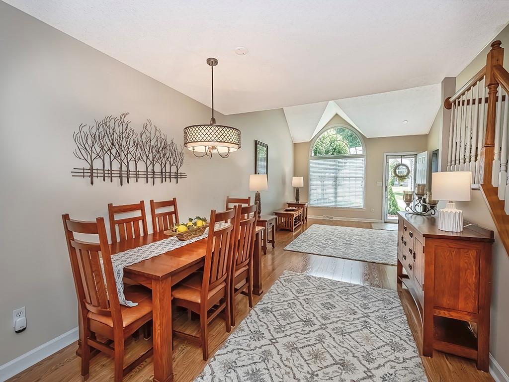 406 Country View Drive Lower Burrell, PA 15068 - Photo 9 of 31 a view of a dining room and livingroom with furniture wooden floor a chandelier