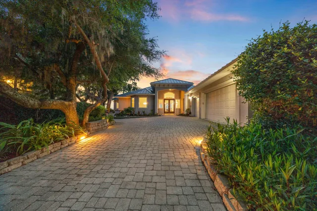 a wooden bench with view of trees