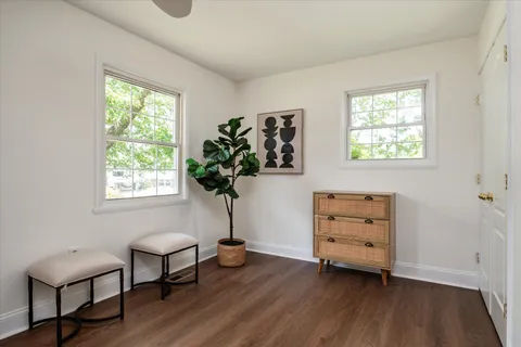 a room with furniture and a window