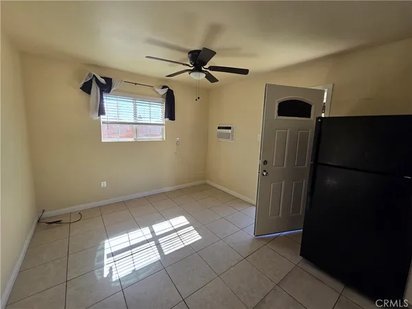 a view of empty room with windows