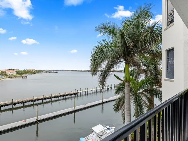 a view of a balcony and lake view
