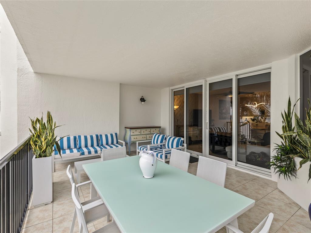 2700 North Federal Highway, Unit 407 Boynton Beach, FL 33435 - Photo 30 of 31 a view of a two chair in the patio