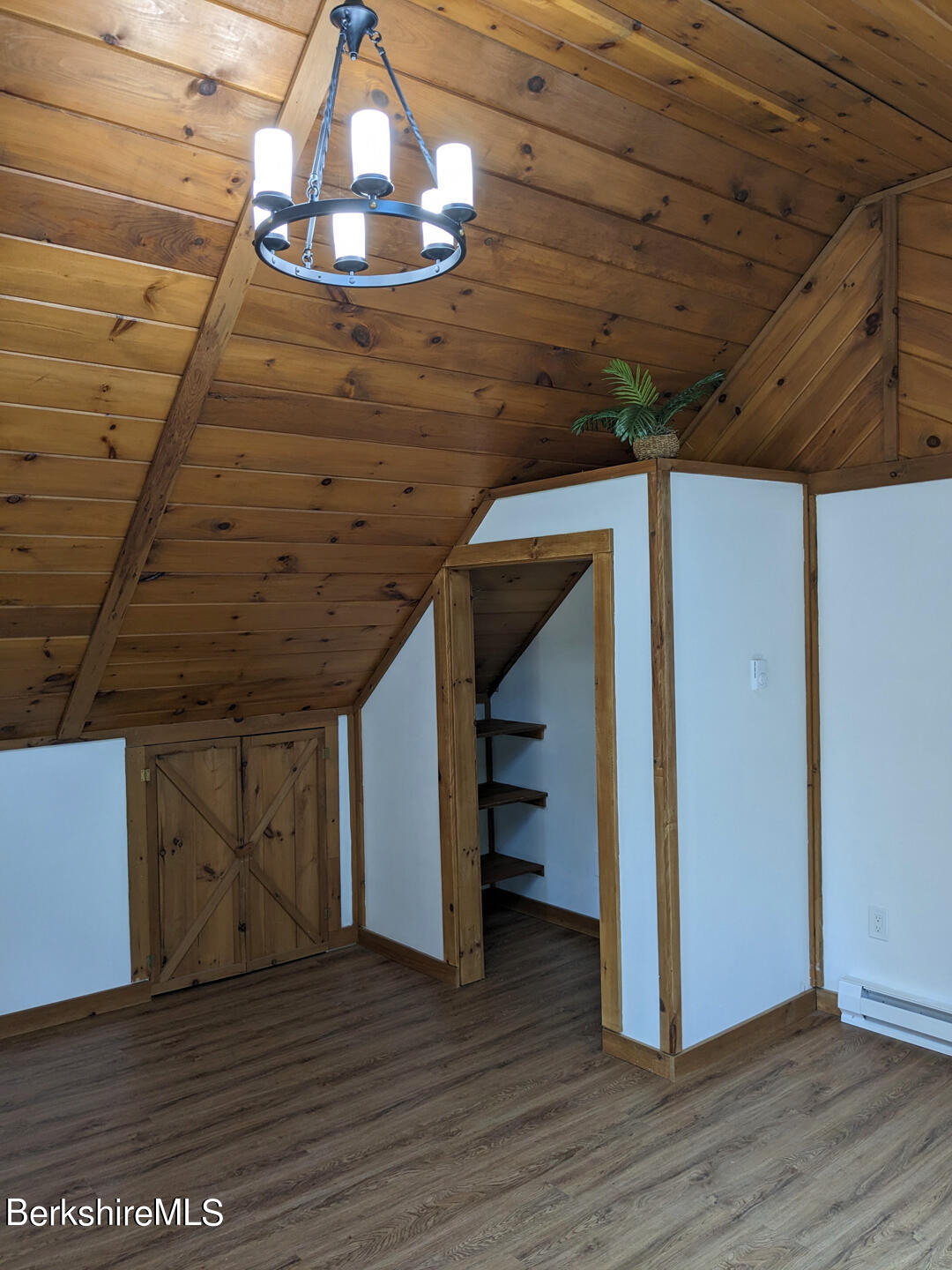 1430 Old Rte 9 Windsor, MA 01270 - Photo 10 of 24 a view of an empty room with wooden floor