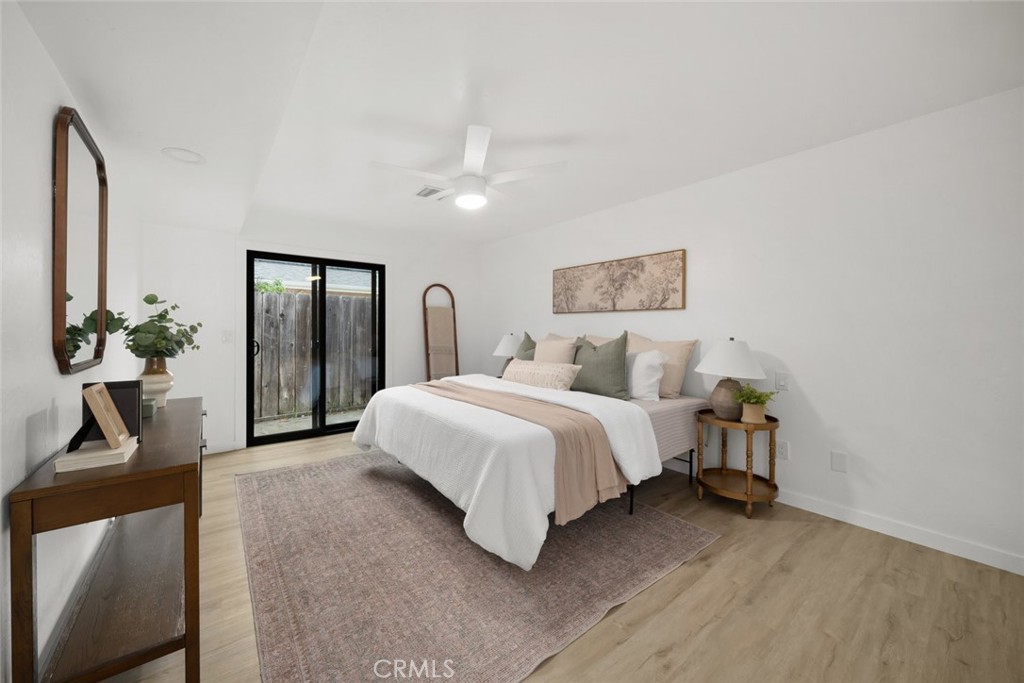 928 Austin Court Paso Robles, CA 93446 - Photo 21 of 30 a bedroom with bed and a chandelier