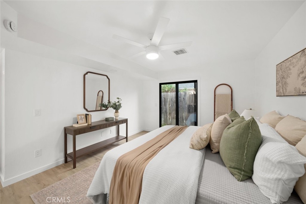 928 Austin Court Paso Robles, CA 93446 - Photo 22 of 30 a bedroom with a bed and a table