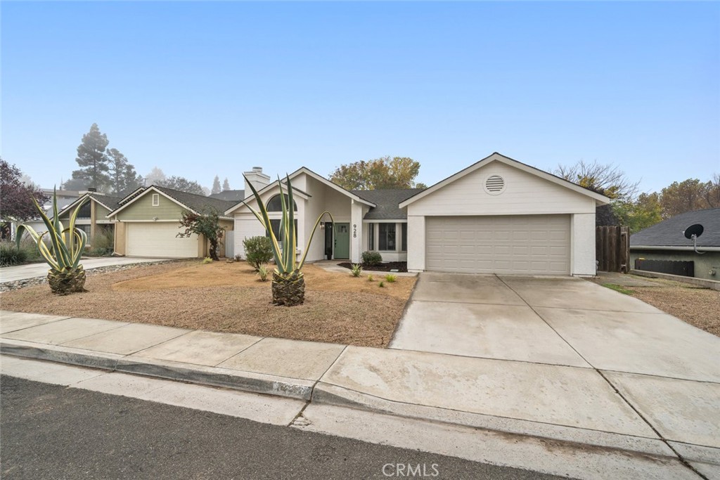 928 Austin Court Paso Robles, CA 93446 - Photo 30 of 30 a view of house and yard with car parked